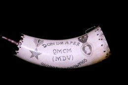 A Decorated VeteranThe client earned a Bronze Star with a valor device and a Purple Heart with two stars.  He wanted to commemorate his service with his name, military designation and dates of service on the inside curve of the horn.