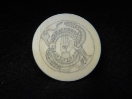 The Seeing HandThis was an ivory medallion about 1 ½ inches in diameter.  The client asked for this image. The “Hand of Fatima”, or the “Hand of Miriam” as it is known in the middle east is an image found around the world in various cultures.  Here it is a Mesoamerican interpretation where the hand is encircled in two rattlesnakes who are themselves intertwined.