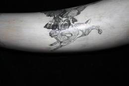 An Eagle takes a HareI had this image in a book of animals and I thought it would look great on a horn.  The eagle has the hare by the back with his left foot and is about to strike a death blow with his poised right foot.  I think the hare looks like he knows what’s coming.