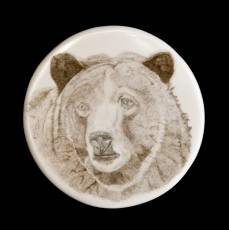 Red BearThis is the obverse of one of two medallions I did for a couple.  They were on Corian, 1 ¾ inches in diameter and about 1/8 inch thick.  I did this bear under extreme magnification from a photograph.