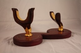 Moer Horn Stand - Guilded Uprights The Moler StandThe base of the stand is purpleheart. The uprights are rosewood. They’re lined with buckskin. The bases are gilded in 24k gold leaf in a freeform design.