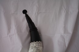 The Coplin Horn - Throat Detail The Fluted SpoutThe spout is faceted and has a fluted collar around it.