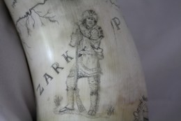 Ozark Frontiersman LonghunterOn the inside curve I did an image of a longhunter superimposed on the lettering of the Ozark Plateau.