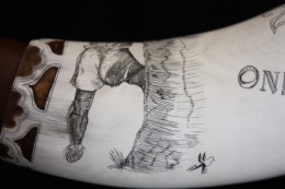 The Hunter Leg Detail The Hunter - Leg DetailAs is usual with horns, it is impossible to take a close up of a whole image due to the curvature of the surface. Hence, I have taken this photo of the hunter below the waist to show the detail. You can also see some more detail of the engrailing.