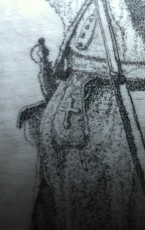 I like to put very fine detail into my images.  This is an example of one that's fairly obvious: a cross on the bag hanging at the longhunter's waist.  There are lots of others on this particular piece