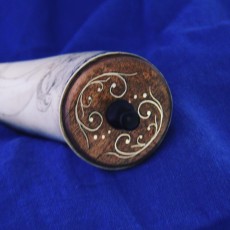 Silverwire inlay in a turned maple plug witha turned horn finial